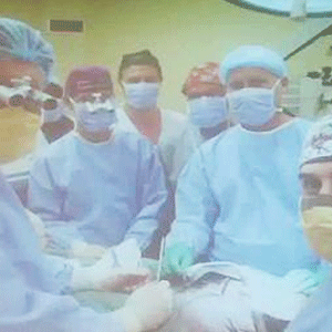 In this screengrab from the presentation at the Stellenbosch University health faculty the physicians are shown at working during the transplant procedure. 