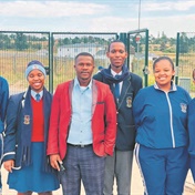 Holy Cross Senior Secondary learners win library in a reading competition 