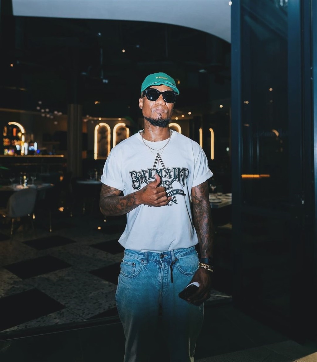 Teko Modise styled in quite the pricey 'fit on his latest Instagram post, where he combines high-end fashion with local brands.