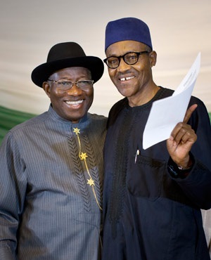 Nigeria's President Goodluck Jonathan, and opposition candidate General Muhammadu Buhari, after signing a renewal of their pledge to hold peaceful "free, fair, and credible" elections. (Ben Curtis, AP)