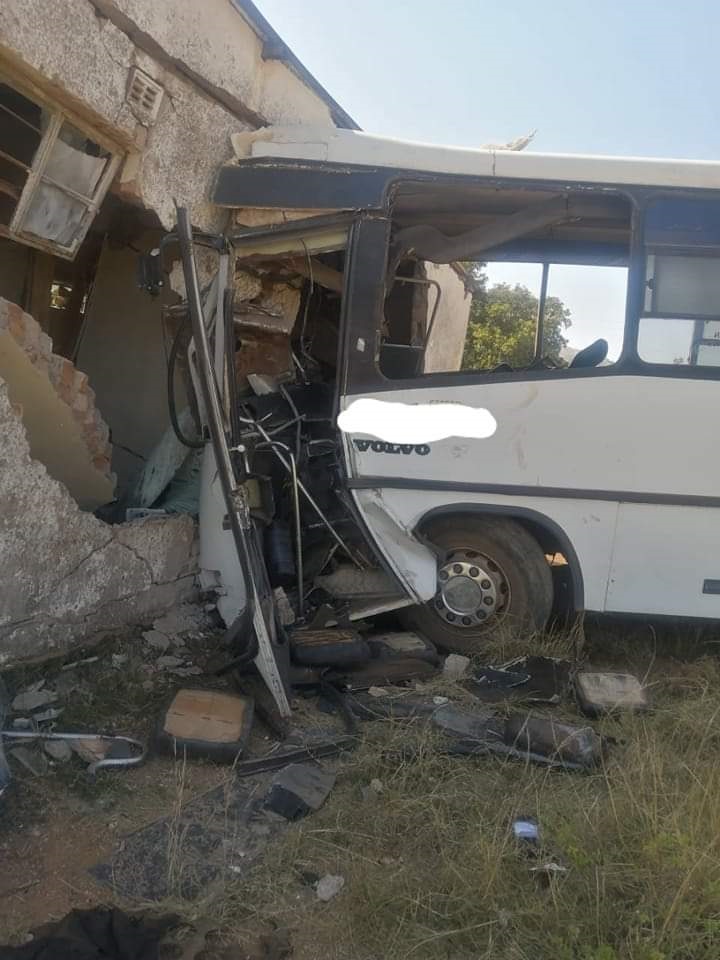 Two pupils lost their lives and 20 were injured when the bus they were travelling in lost control and crashed into an old building.