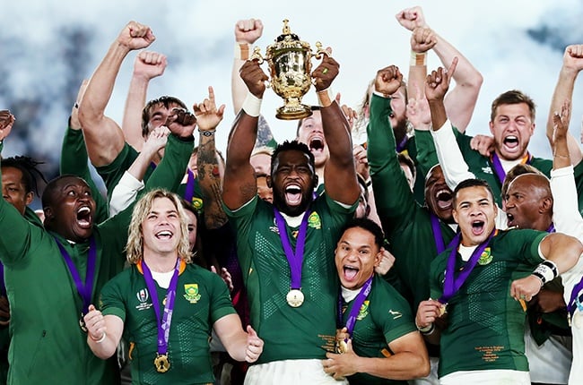 Siya Kolisi of South Africa lifts the Web Ellis cup following his team's victory against England in the Rugby World Cup 2019 Final.
