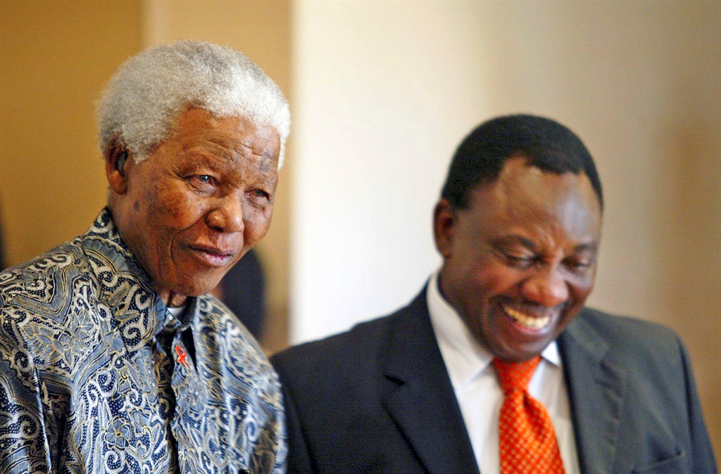 Former South African president, Nelson Mandela, and Cyril Ramaphosa, sharing a humorous moment.  The author writes South Africans are slowly realising that we need to give up the search for the next Mandela, both because s/he does not exist and in fact we do not need such a type of leader at this time. 