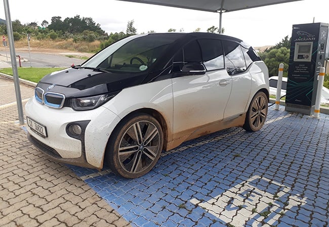 BMW i3 charging at another EV station