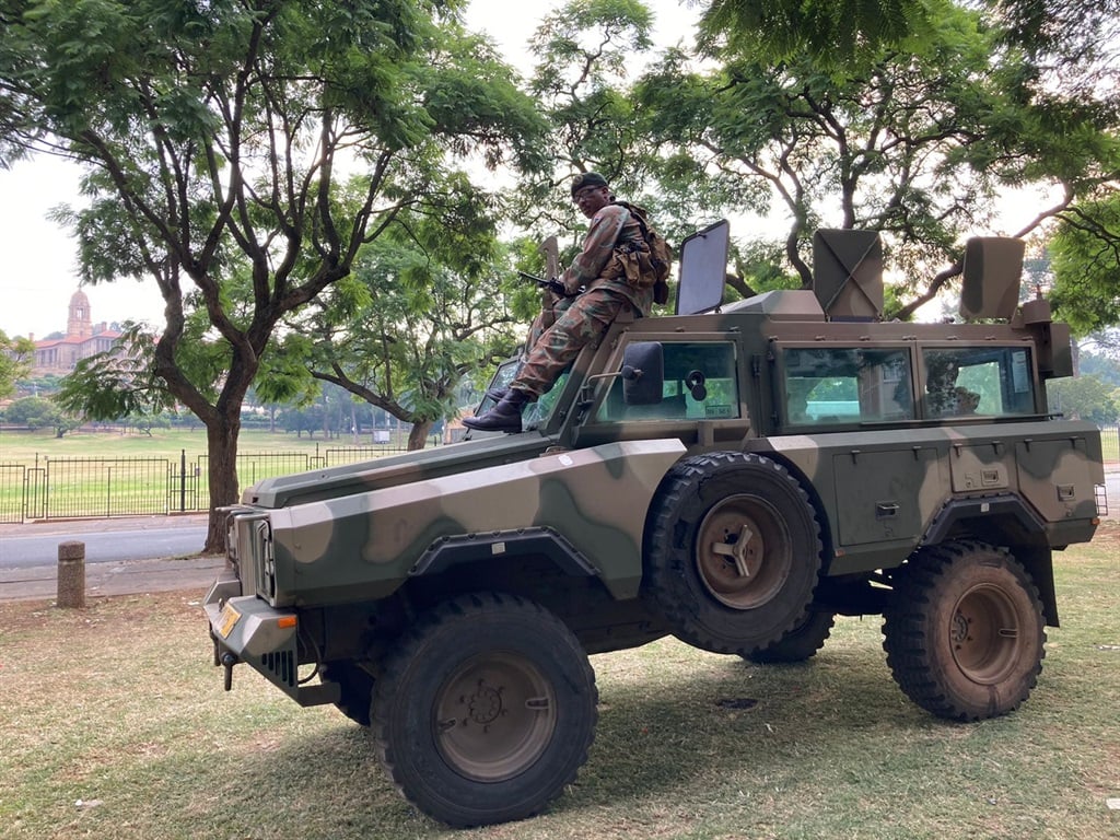 SANDF personnel stationed outside the Union Buildings in Pretoria on 20 March 2023.