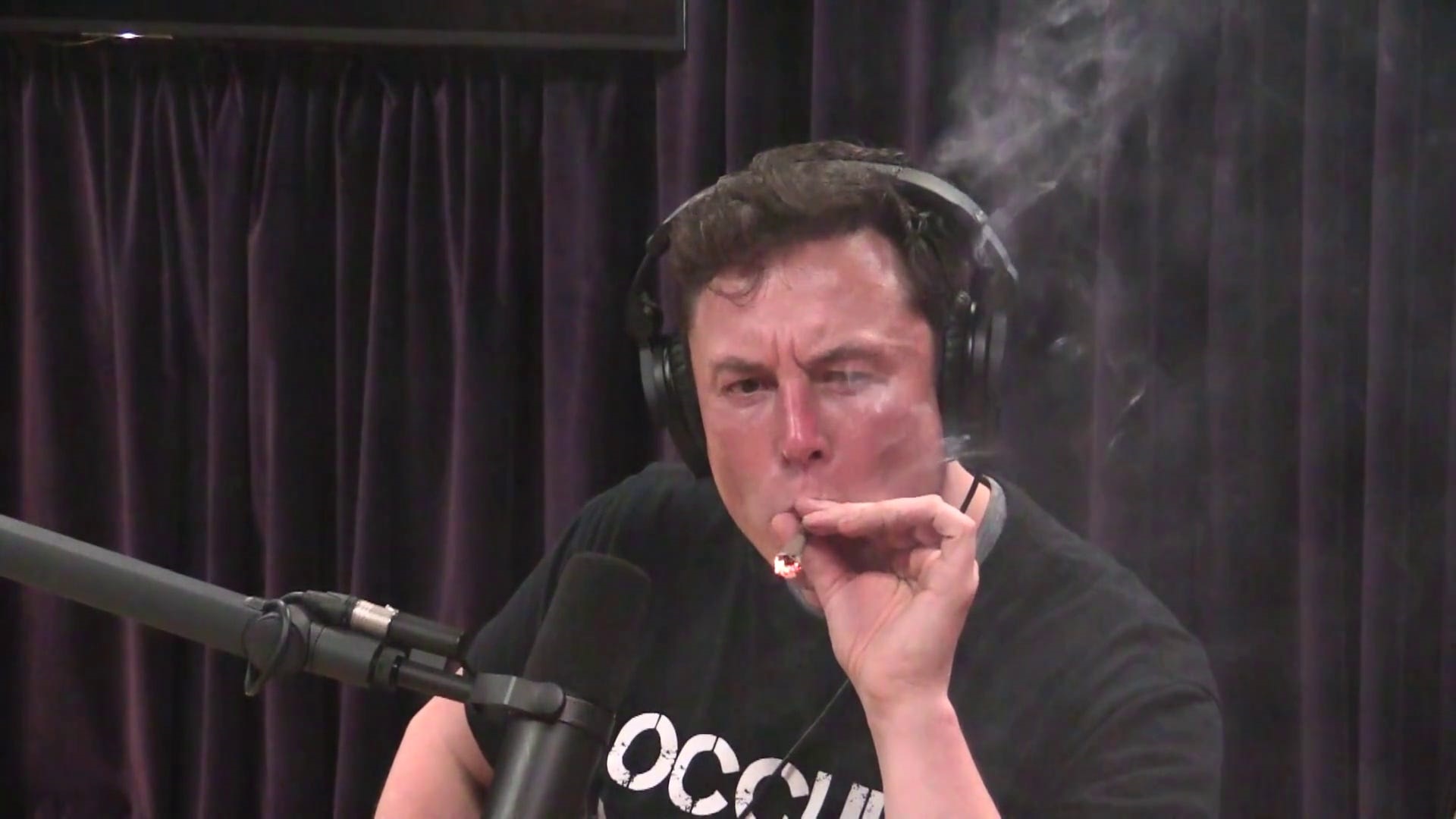 Billionaire Elon Musk smoking weed on The Joe Rogan Experience podcast. The Joe Rogan Experience/YouTube
