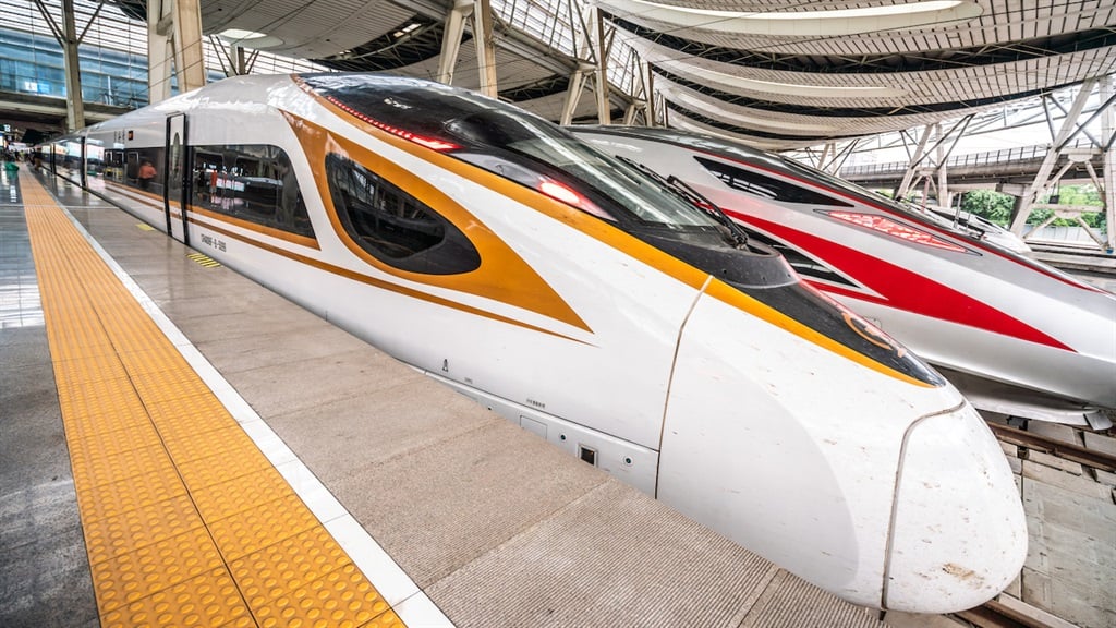 Fuxing high speed trains operated by China Railway Corporation seen at the South Railway Station in Beijing. (Photo by Alex Tai/SOPA Images/LightRocket via Getty Images)