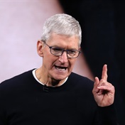 Apple CEO Cook stresses ties with China at Beijing event