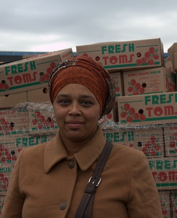 Fresh produce trader Tasneem Brenner from Delft says many people in her area are struggling, so she can't increase the prices. Instead she'll have to absorb the fuel costs, thus give up profit. (Erin Bates, News24)