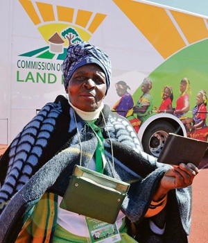 Paulinah Hadebe (74) shows her old dompas, one of the documents she is using to lodge a claim on a portion of the Rondebeel Farm near Lindley. Picture: Lucky Nxumalo