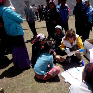 MSF nurse, Anne Kluijtmans providing medical assistance in remote regions of Nepal. Photo: MSF.