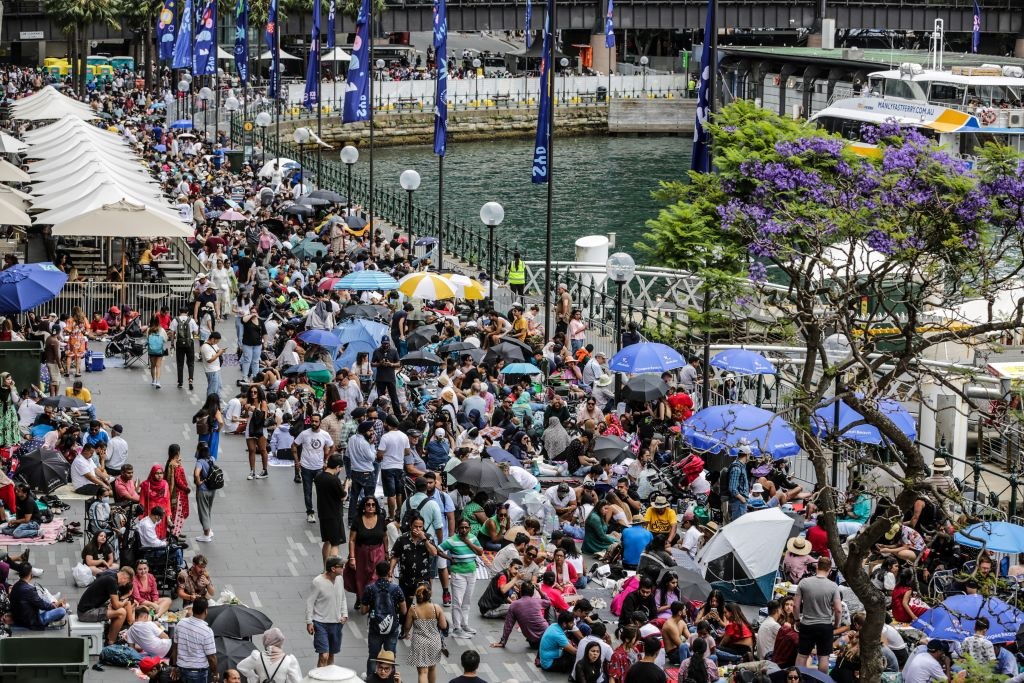 People gather at Circular Quay ahead of New Years Eve celebration on December 31, 2022 in Sydney, Australia. 