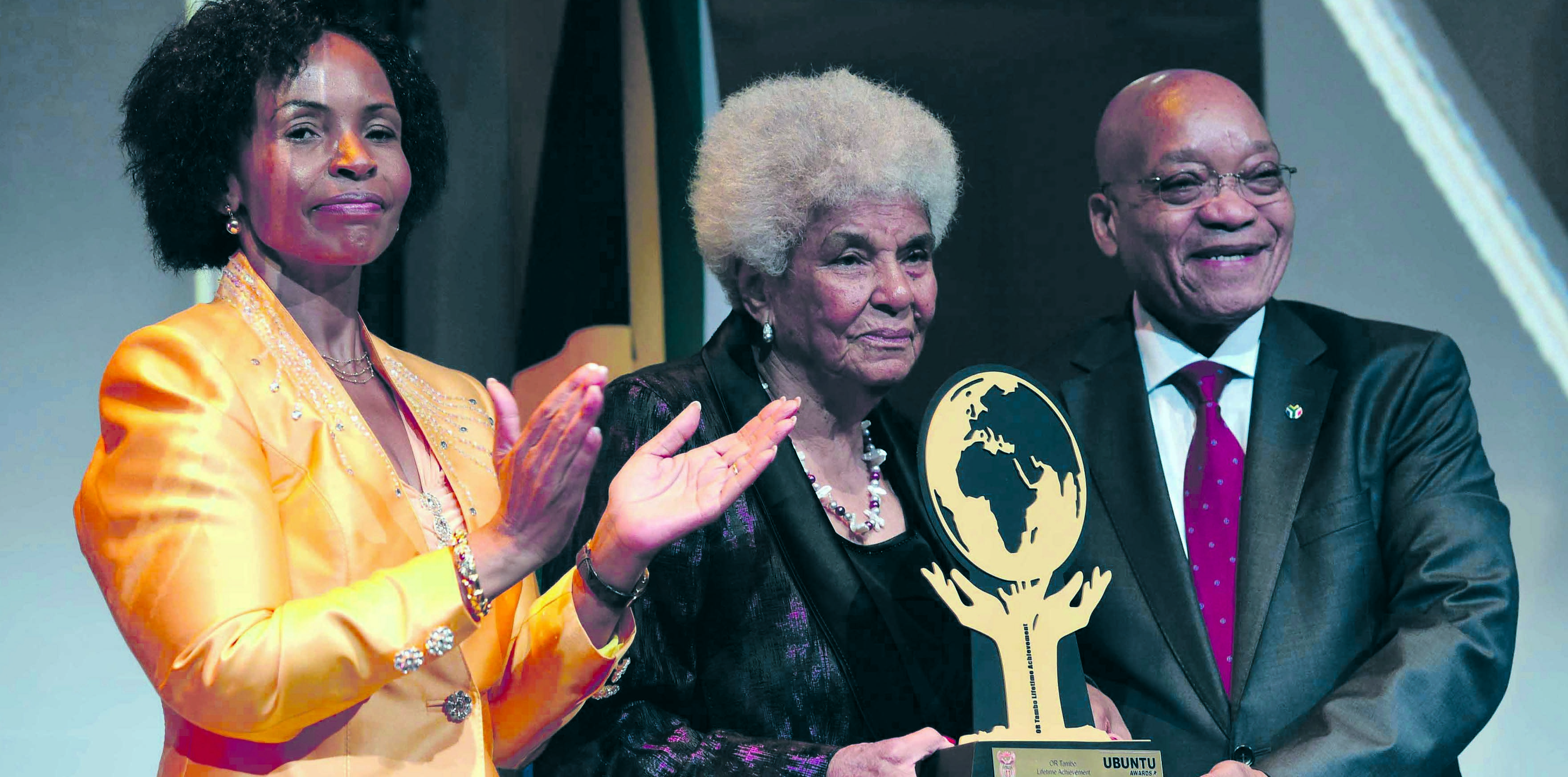EVERYONE’S AUNT
 Dr Ruth Mompati receives the OR Tambo Lifetime Achievement Award from President Jacob Zuma and Minister Maite Nkoana-Mashabane in February 
PHOTO: elm,ond jiyane


