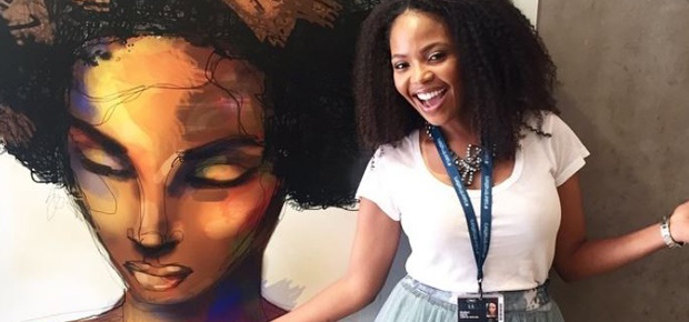Terry Pheto poses next to the Ayanda poster in Cannes (Instagram)
