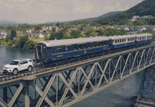 <B>ASTOUNDING...:</B> Whether you believe it or not, this standard Land Rover Discovery Sport with only casters added to keep it on the track, pulled three train carriages weighing a total of 108-ton! <I>Image: YouTube</I>