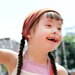 Girl with Down syndrome from Shutterstock