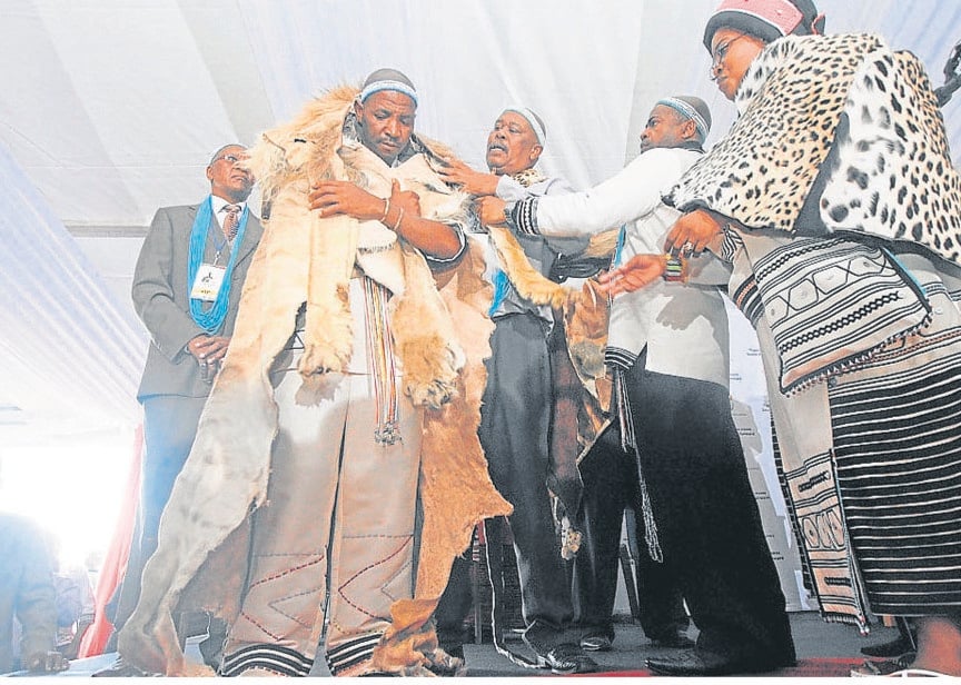 

King Mpendulo Zwelonke Sigcawu is enrobed by AmaRharhabe Queen Regent Noloyiso Sandile during his coronation in Nqadu Great Place in Nqadu, Gatyane.                                                                                                  