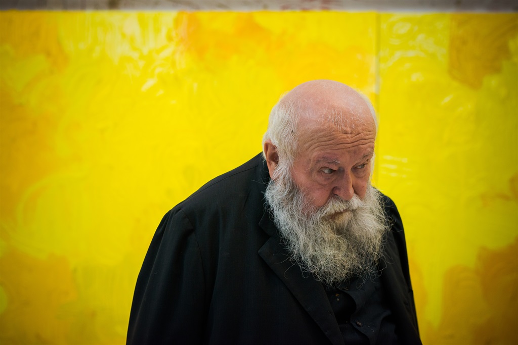 The Austrian painter and action artist Hermann Nitsch stands in front of one of his blue works at his studio at Prinzendorf Castle. He will turn 80 on 29 August 2018. Photo: David Visnjic/dpa (Photo by David Visnjic/picture alliance via Getty Images)