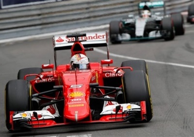 <b>UPGRADED ENGINES FOR MONTREAL:</b> Ferrari team boss Maurizio Arrivabene said his team won't spend 'tokens' though is preparing an upgraded package for the 2015 Canadian GP. <i>Image: AP / Claude Paris</i>