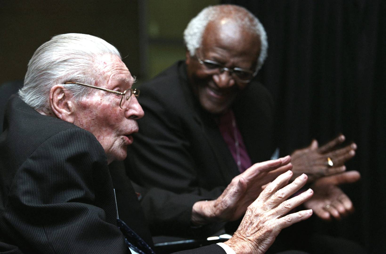 The late Dr Beyers Naudé and Archbishop Emeritus Desmond Tutu share a light moment in 2004.