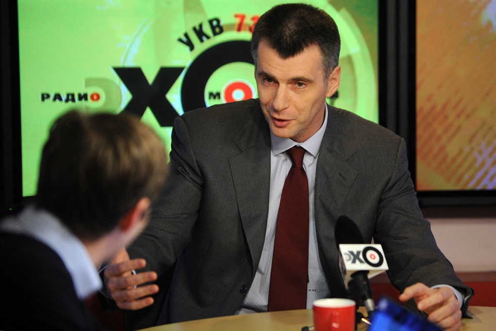 Russian billionaire Mikhail Prokhorov gives an interview at the Ekho Moskvy (Echo of Moscow) radio station in Moscow on January 17, 2012. Ranked Russia's third richest man by Forbes magazine with a fortune of $18 billion, Prokhorov announced in December 2011 he intended to challenge Prime Minister Vladimir Putin in the March 2012 presidential polls. AFP PHOTO/ KIRILL KUDRYAVTSEV
KIRILL KUDRYAVTSEV / AFP