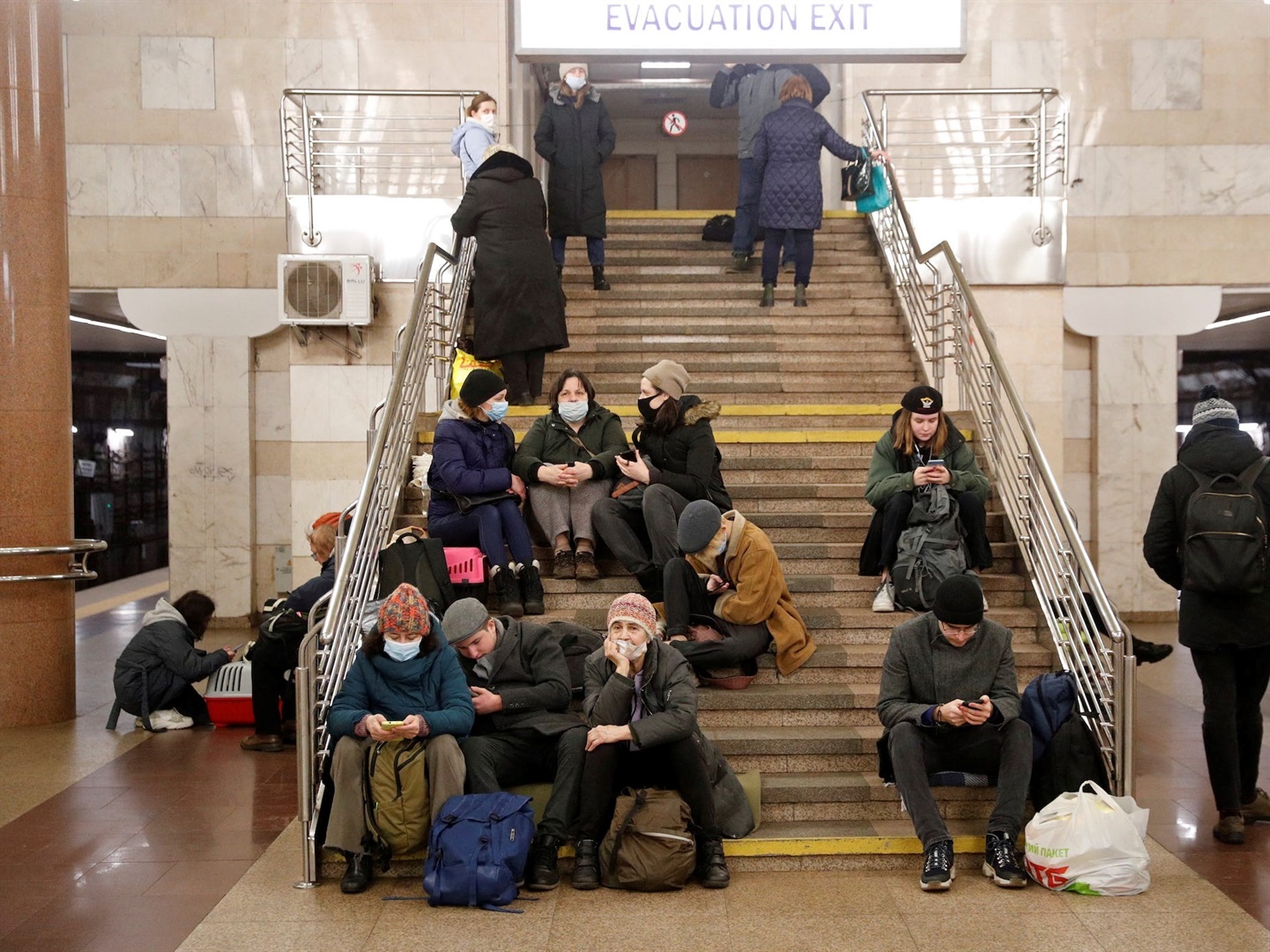 People take shelter in a subway station in Kyiv, Ukraine, on February 24, 2022. Valentyn Ogirenko/Reuters