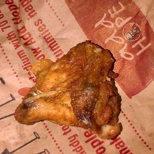 KFC chicken wing with feather attached. (Supplied to Health24)