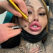 Fans beg plastic surgery addict to stop going under the knife