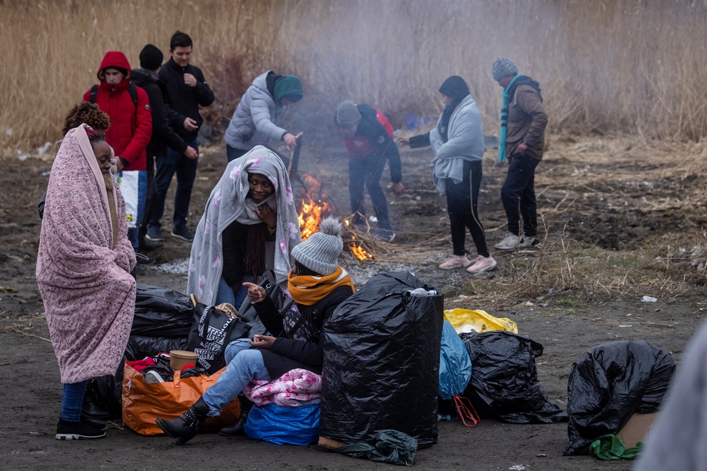 Refugees from many different countries - from Africa, Middle East and India - mostly students of Ukrainian universities are seen at the Medyka pedestrian border crossing fleeing the conflict in Ukraine, in eastern Poland on 27 February, 2022. 