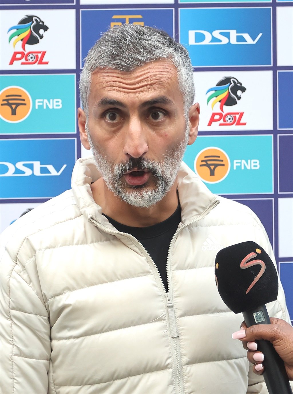 CAPE TOWN, SOUTH AFRICA - MAY 01: Orlando Pirates coach Jose Riveiro is interviewed after the DStv Premiership match between Cape Town City FC and Orlando Pirates at DHL Cape Town Stadium on May 01, 2024 in Cape Town, South Africa. (Photo by Shaun Roy/Gallo Images)
