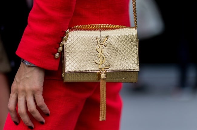 Yves Saint Laurent sends silky evening gowns down Eiffel Tower runway