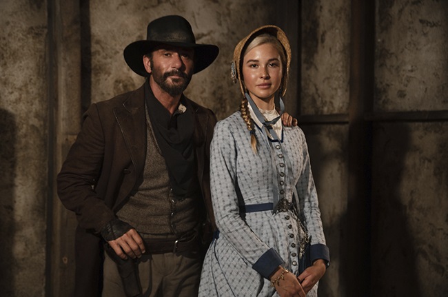 Tim McGraw as James and Isabel May as Elsa of the Paramount+ original series 1883
