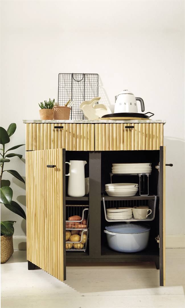 Terracotta pots and black tray from H&M; cutting board and crockery from Mr Price Home; kettle and cooling rack from Woolworths; stackable baskets, under-shelf basket and acrylic corner shelf from @home