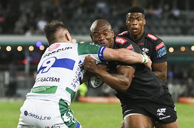 Makazole Mapimpi tackled by Dewaldt Duvenhage. (Photo by Steve Haag Sports/Gallo Images)