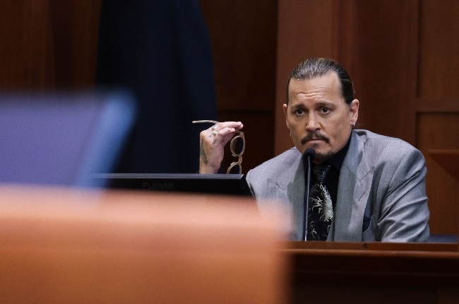 Johnny Depp testifies during day two of his trial against his ex-wife, Amber Heard. (PHOTO: Getty Images/AFP)