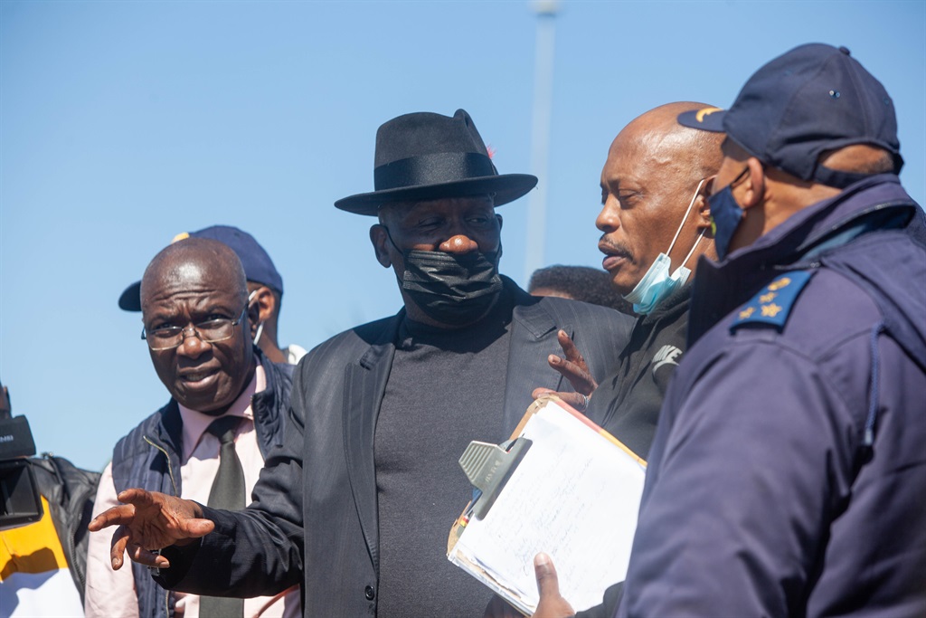 Police Minister Bheki Cele inspects the informal settlement in Kliptown on April 20, 2022 in Soweto. The visit comes after recent violent clashes and shootings in the Kliptown policing precinct and surrounding areas. Photo: Gallo Images/Papi Morake
