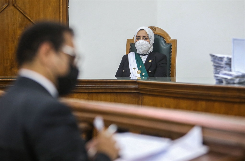 Egyptian female judge Radwa Helmi Ahmad sits on her first court hearing at the State Council in the capital Cairo.