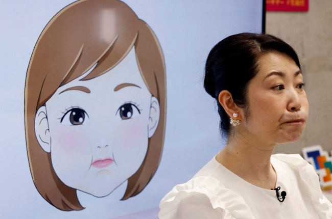 Keiko Kawano from Japan teaches people how to smile. (PHOTO: Gallo Images/Getty Images)