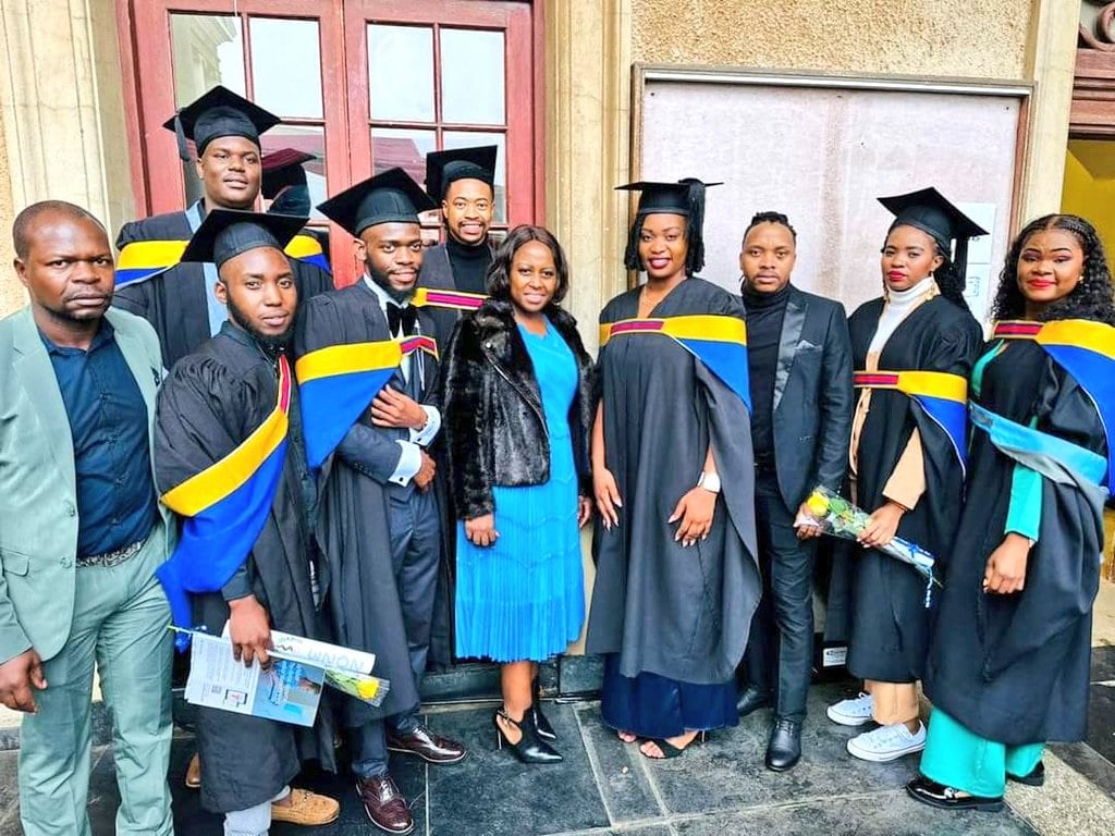 Mpumalanga Health MEC Sasekani Manzini (blue dress) with some of the 61 medical students who  graduated from the Nelson Mandela/Fidel Castro Medical Collaboration Programme.