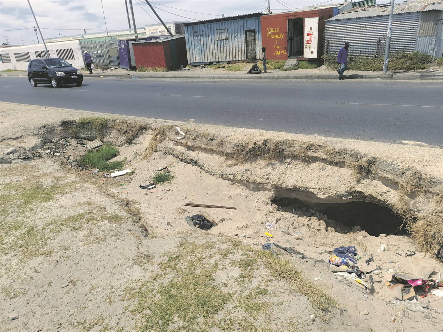Govan Mbeki Road in Philippi, Cape Town, is at risk of collapsing.  Photo by    Misheck    Makora