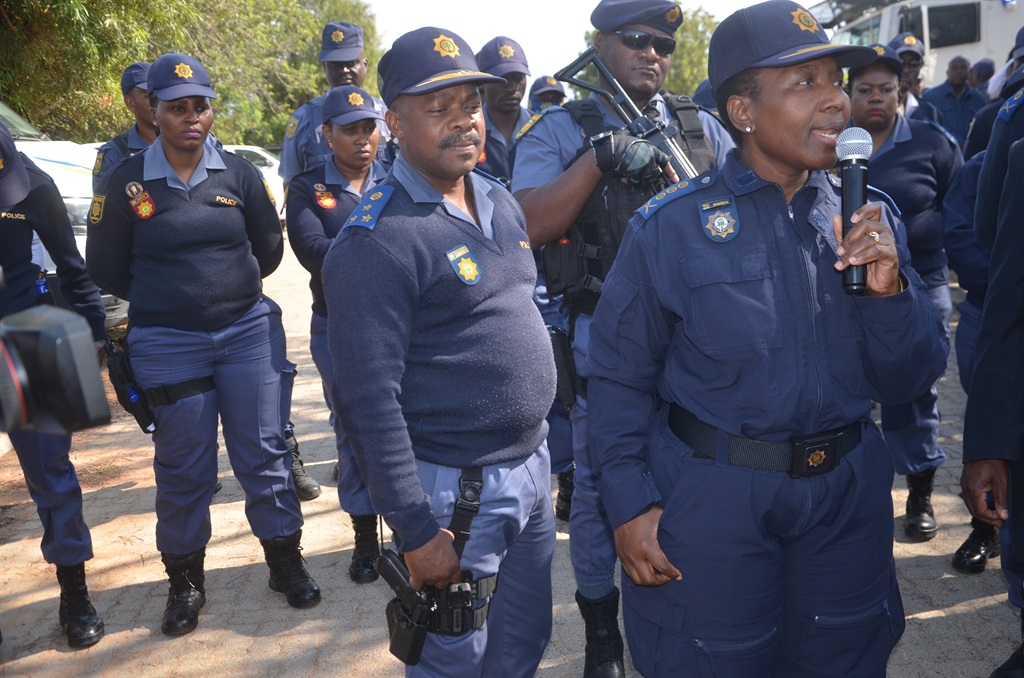 Mpumalanga Police Commissioner Lieutenant-General Semakaleng Manamela (with a mic) praised an off-duty cop for his bravery. Photo by Oris Mnisi 