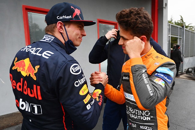 Pole position qualifier Max Verstappen of the Netherlands and Oracle Red Bull Racing and Third placed qualifier Lando Norris of Great Britain and McLaren talk in parc ferme during qualifying ahead of the F1 Grand Prix of Emilia Romagna at Autodromo Enzo e Dino Ferrari on April 22, 2022 in Imola, Italy. 