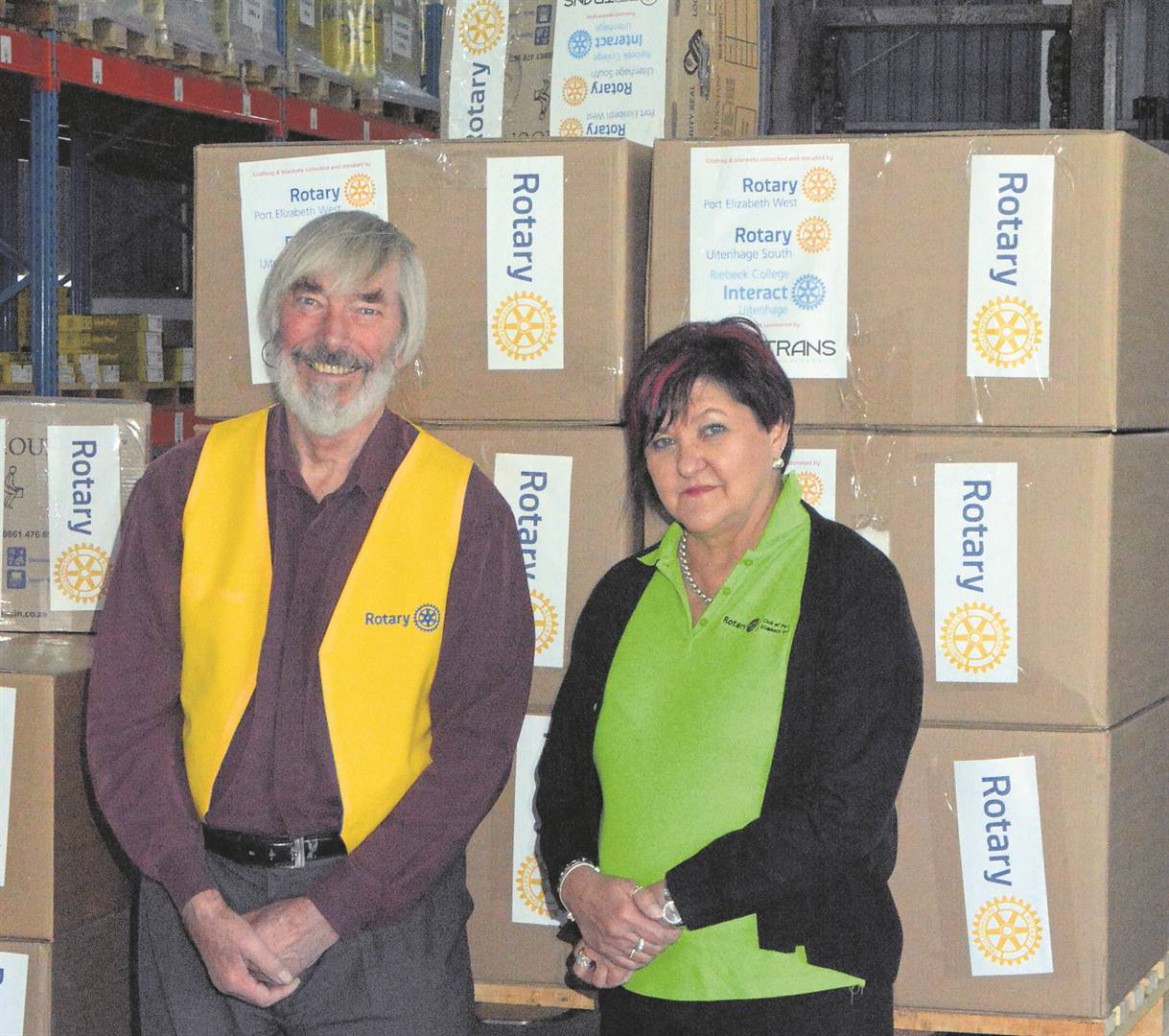 Clive Hassell, President of the Rotary Club of Uitenhage South and Karin Knoesen, past president of the Rotary Club of Port Elizabeth West with the consignment of clothing and blankets heading for Durban. 