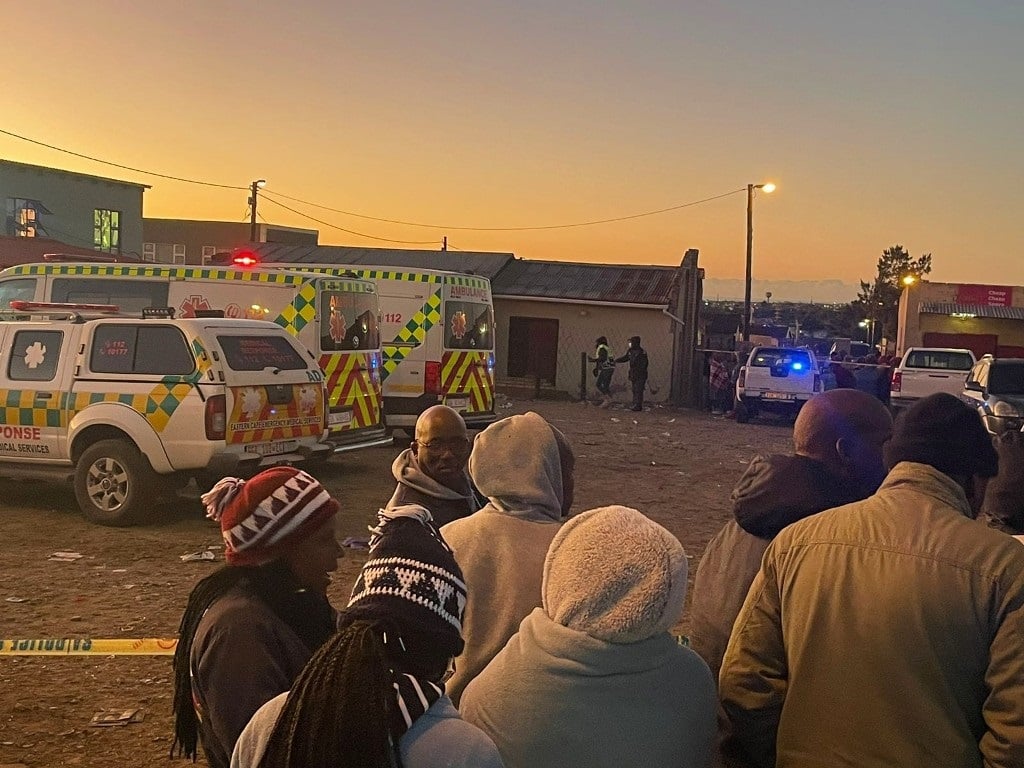 Authorities transported the bodies of at least 17 people who were found dead at an East London tavern to the state mortuary.