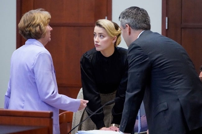 Amber Heard and her lawyers. (PHOTO: Getty/Gallo i