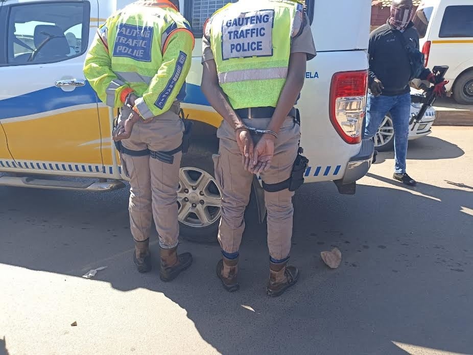 Two bogus cops wearing Gauteng Traffic Police uniforms were arrested after they hijacked and shot their victim in Tembisa, Ekurhuleni.