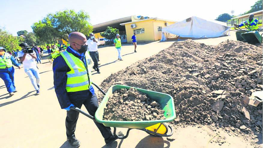 KwaZulu-Natal Premier Sihle Zikalala led a massive clean-up campaign around Edwin Swales and the Rossburgh Driver License Testing Centre (DLTC) that was damaged in the recent floods.
