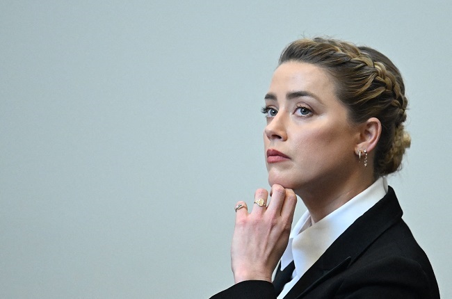 Amber Heard looks on during a hearing at the Fairfax County Circuit Courthouse in Fairfax.