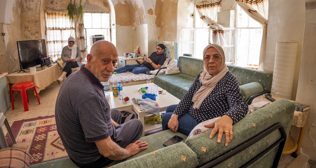 Palestinian couple Nora (R) and Mustafa Sub Laban face eviction from their in home in Jerusalem's Old City.  After decades of legal wrangling, they are set to be evicted from their home in the ancient Muslim Quarter to make way for Jewish settlers.