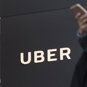 Uber to cut costs, slow down hiring, CEO tells staff 